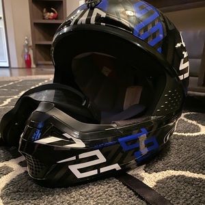 Dirt bike helmet and riding boots